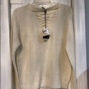 A white lace v Neck sweater